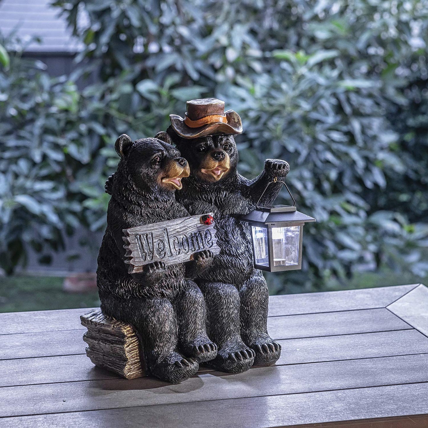 Alpine Corporation 15" H Outdoor Bear Couple with Lantern and Welcome Sign Statue with Solar LED Lights, Black