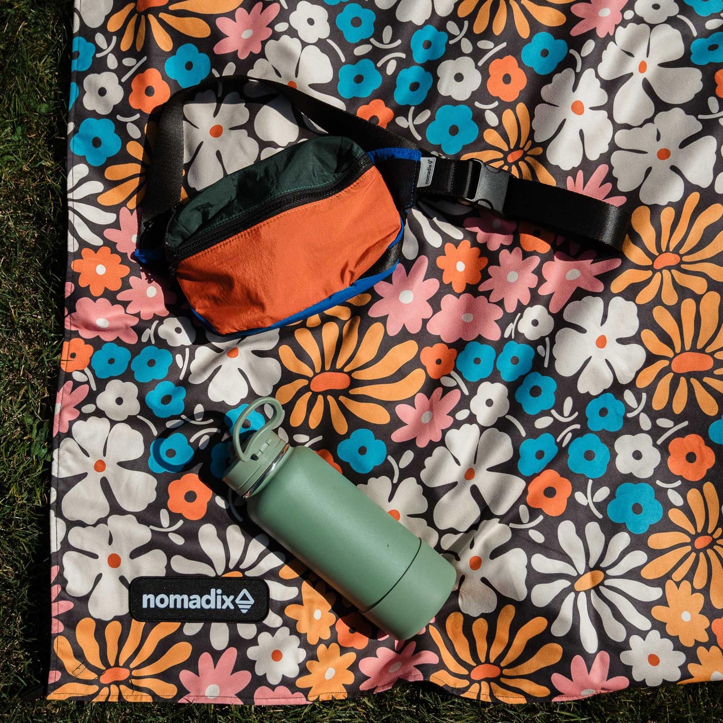 Nomadix Festival Blanket - Perfect for Picnics, Camping, & Lawn Seating - Plush Top & Water Resistant Base - Made with Post Consumer Recycled Materials - Hula Multi - 60x72